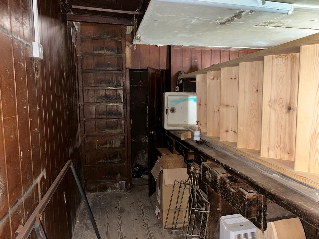Lot: 60 - FORMER PAWN SHOP OVER THREE STOREYS - Ground Floor of shop with space saving staircase set into the wall